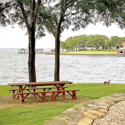 Heritage Large Wooden Picnic Table (Options: 10' L, 36" W, Side Benches, Unattached Benches, 2 Half Length Benches Per Side, Standard Tabletop, Slightly Rounded Corners, No Umbrella Hole, Transparent Premium Sealant). Photo Courtesy of J. Long of Carrollton, Texas.
